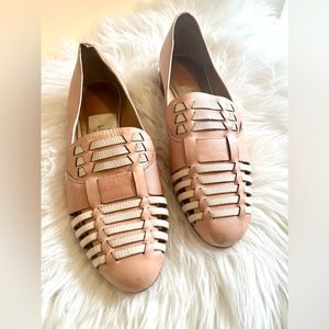 Dolce Vita cream colored flats.